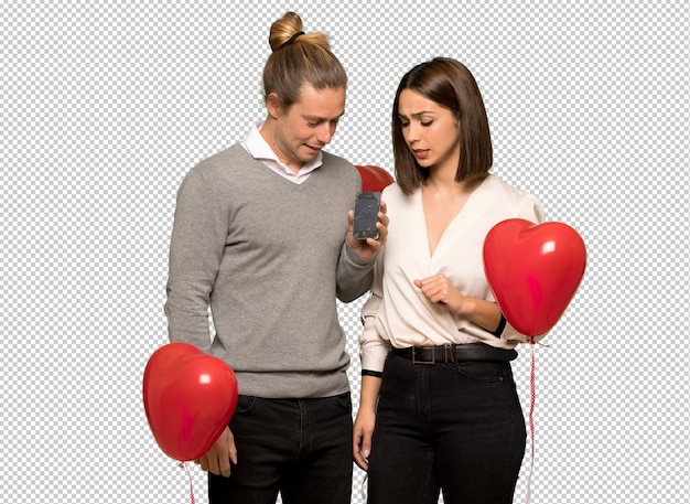 Couple in valentine day with troubled holding broken smartphone