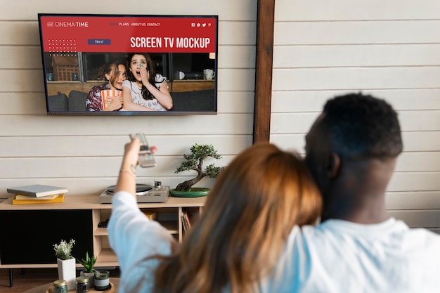 PSD couple watching netflix on a mock-up tv screen