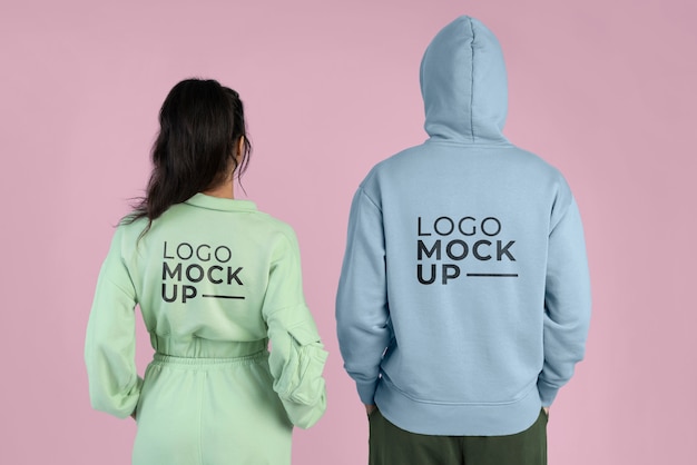 Couple wearing jogger pants and hoodie mockup