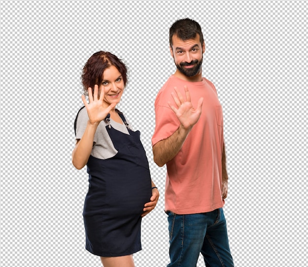 PSD couple with pregnant woman counting five with fingers