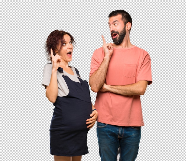 PSD couple with pregnant woman intending to realizes the solution while lifting a finger up