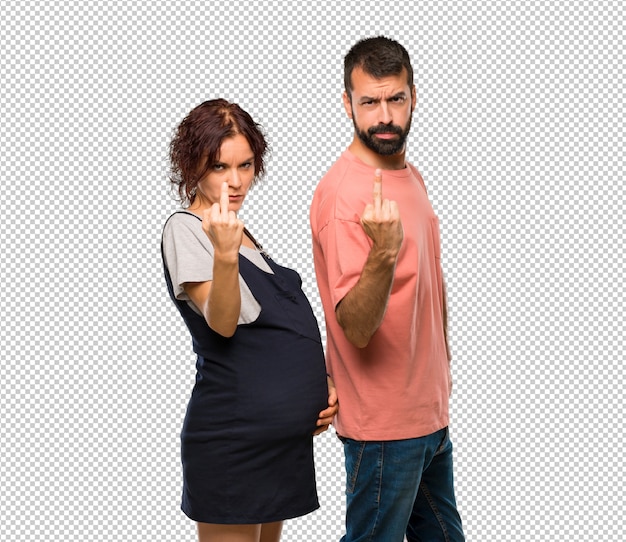 PSD couple with pregnant woman making horn gesture. negative expression