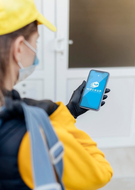 courier holding phone mockup