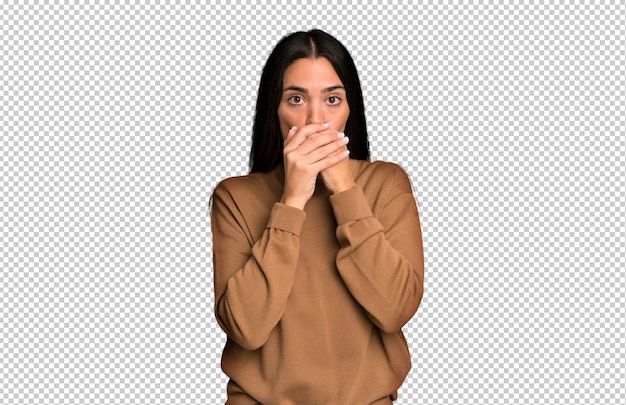PSD covering mouth with hands with a shocked surprised expression keeping a secret or saying oops