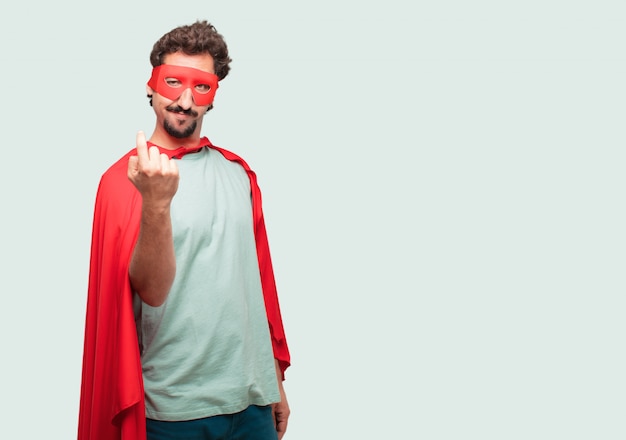 crazy man as a super hero smiling with a proud, satisfied and happy look