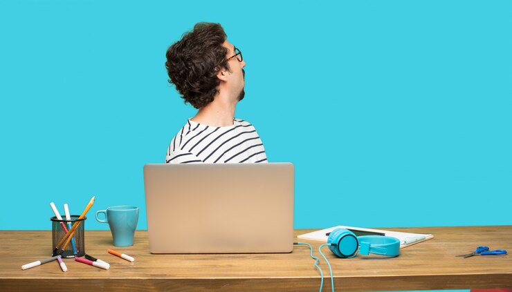 PSD crazy man with laptop looking behind