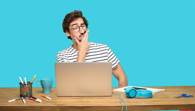 PSD crazy man with laptop in thinking pose