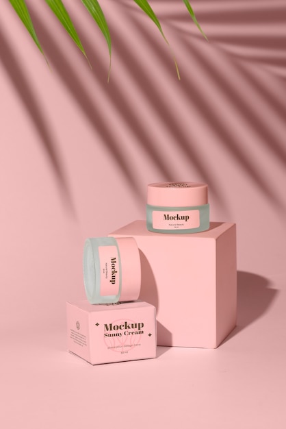 cream containers composition with pink background
