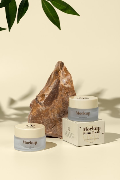 cream containers and rock arrangement