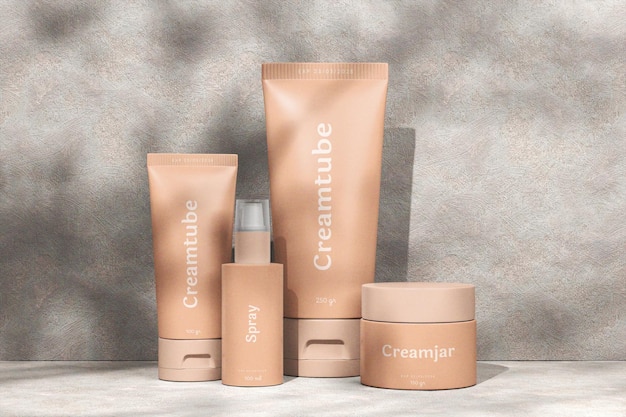 Cream Tube Cream Jar and Spray Cosmetics Products on Beige Background
