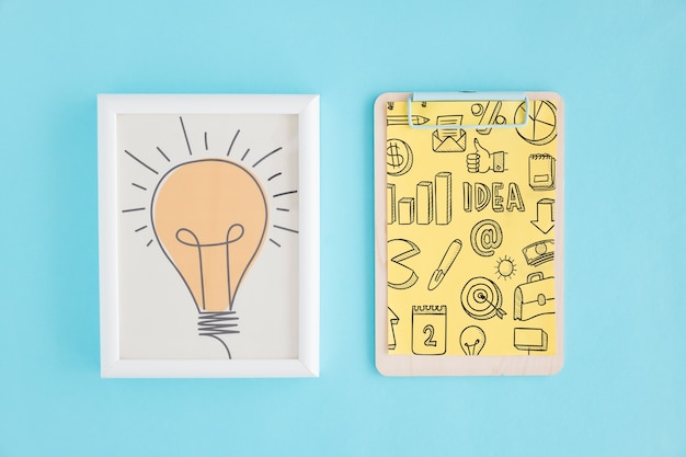 creativity concept with frame and clipboard