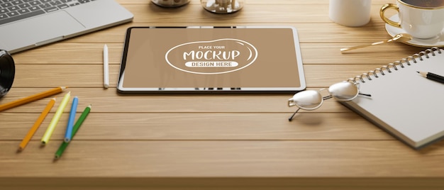 木製のテーブル3dイラストに文房具とモックアップタブレットと研究テーブルのトリミングされたショット