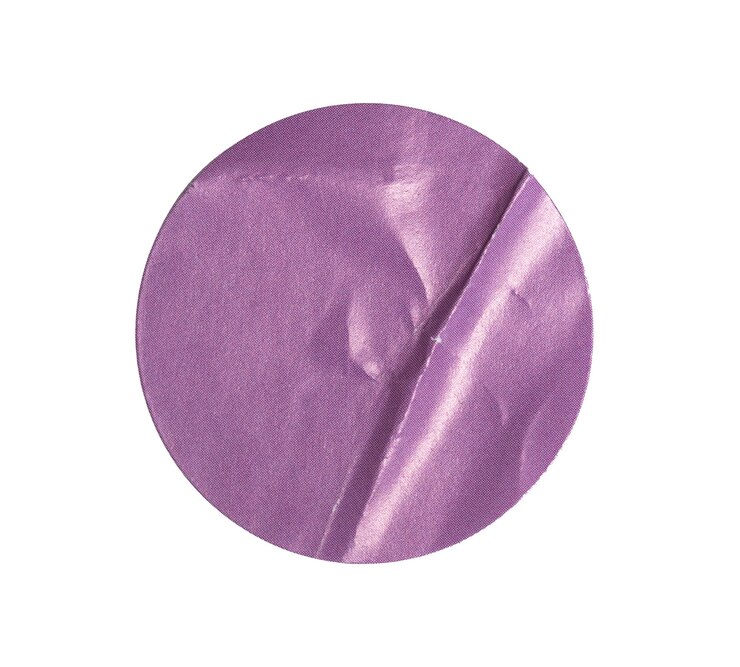 PSD crumpled purple round sticker paper with transparent background creating
