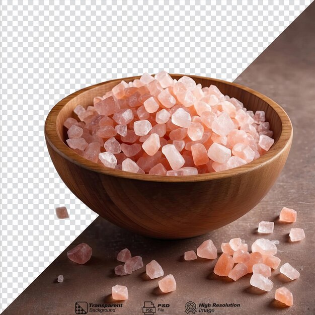 Crystalline himalayan pink salt in a wooden bowl isolated on transparent background