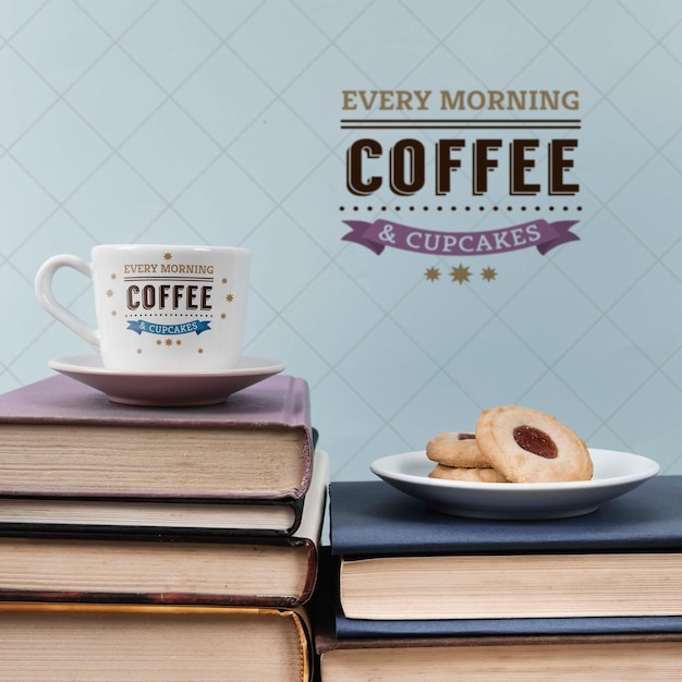 PSD cup of coffee and cookies on a pile of books