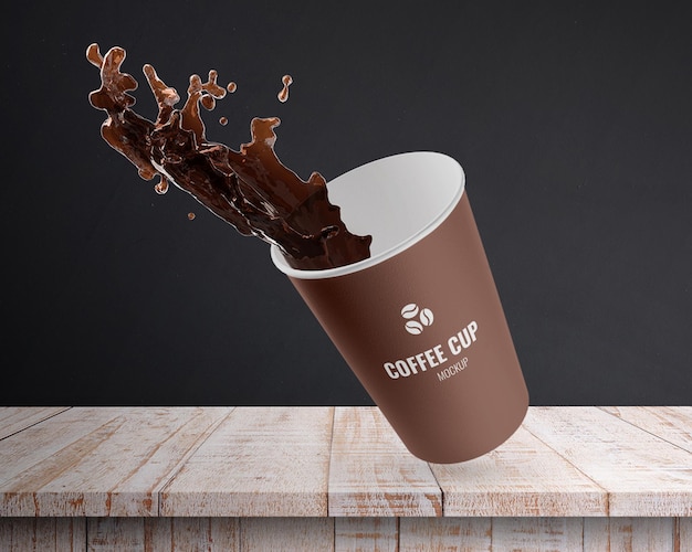 PSD a cup of coffee is being poured into a cup coffee paper cup mockup free