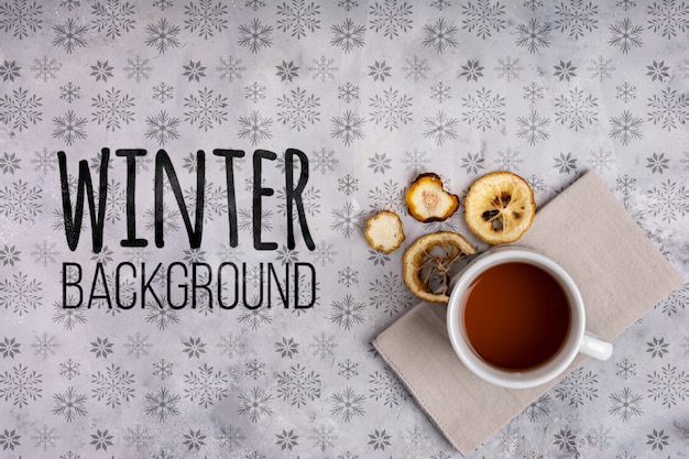 PSD cup of hot tea on winter background