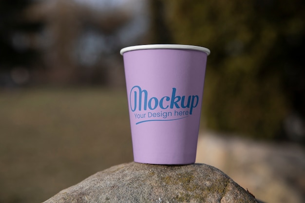 Cup mockup in public space