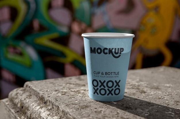 Cup mockup in public space