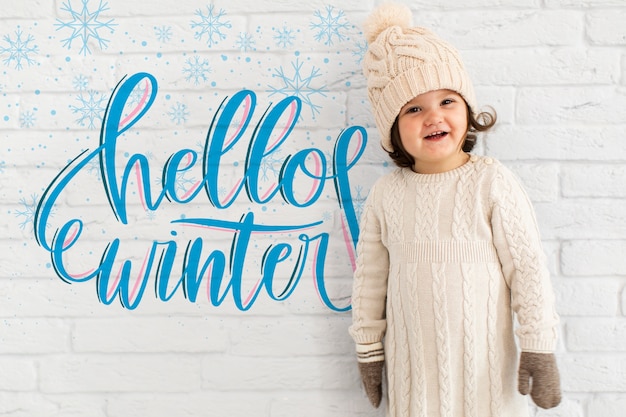 Cute toddler with winter mock-up