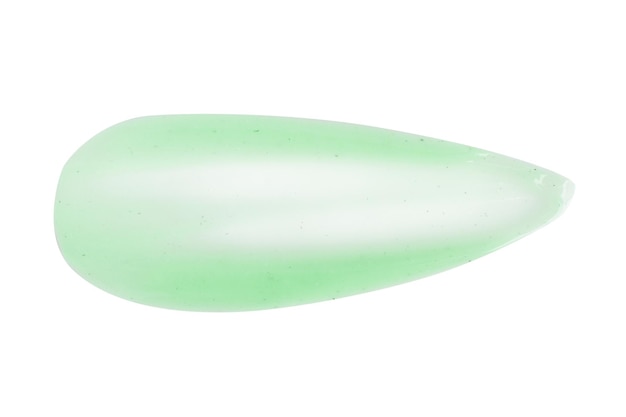 PSD una piccola quantità di crema fresca verde chiaro o maschera per il viso al cetriolo con granuli e macchie su uno sfondo bianco png