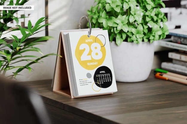 PSD daily desk calendar on the table mockup