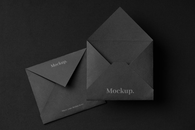 PSD dark envelopes arrangement flat lay