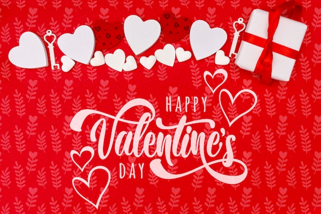 PSD de dagconcept van de gelukkige valentijnskaart met rode achtergrond