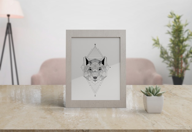 PSD decorative frame mockup on table at home