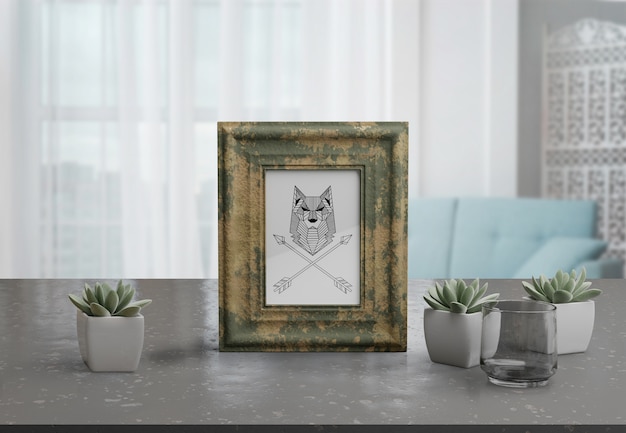 PSD decorative frame mockup on table at home