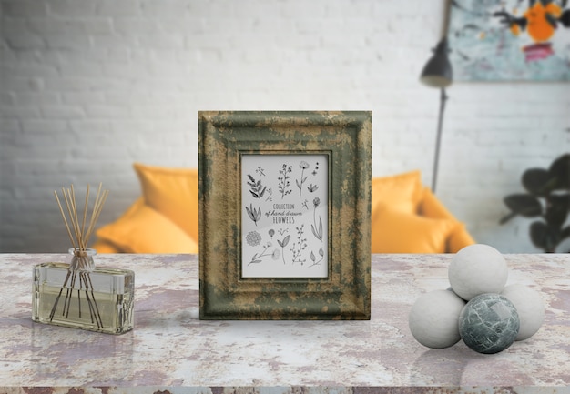 Decorative frame mockup on table at home