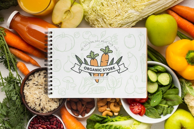 delicious fresh vegetables with notebook on top