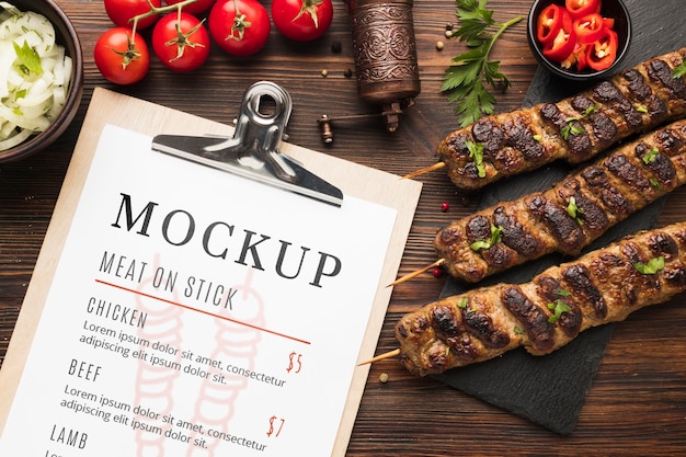 Delicious meat skewers mock-up and menu