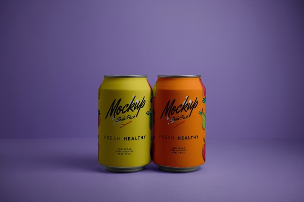 Delicious soda cans with purple background