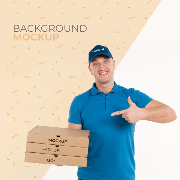 Delivery man holding a bunch of pizza boxes