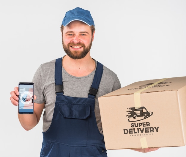 PSD delivery man holding smartphone mockup for labor day