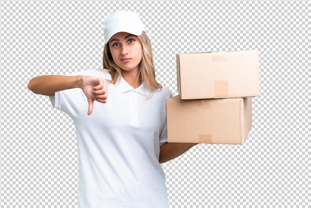 PSD delivery uruguayan woman over isolated background showing thumb down with negative expression
