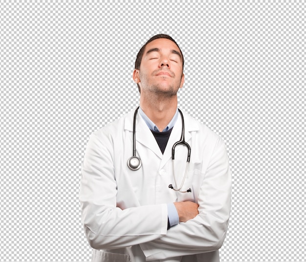 Depressed doctor against white background