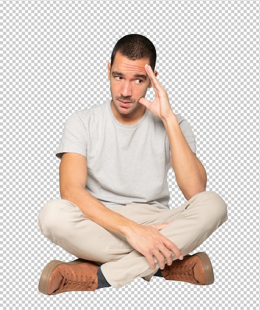 PSD depressed young man posing against background