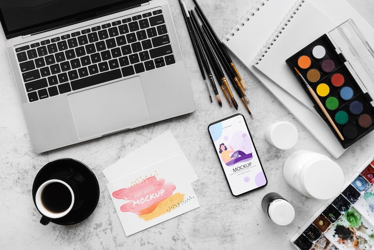 PSD desk of painting artist with laptop