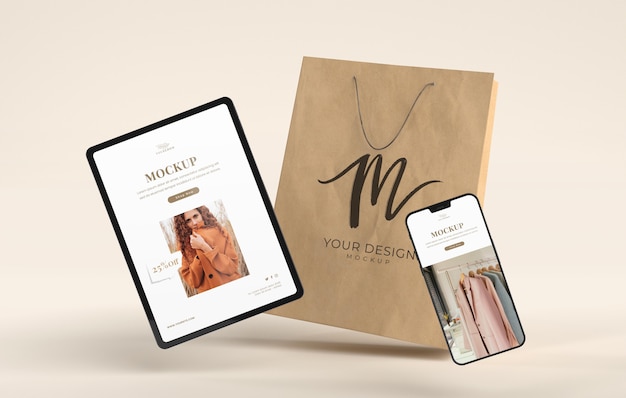 Shopping di dispositivi e mockup di sacchetti di carta