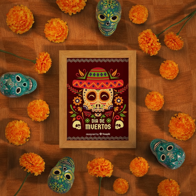 PSD dia de muertos mock-up surrounded by skulls and flowers