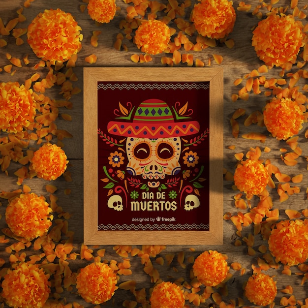 Teschi di dia de muertos con sombrero e fiori vista dall'alto