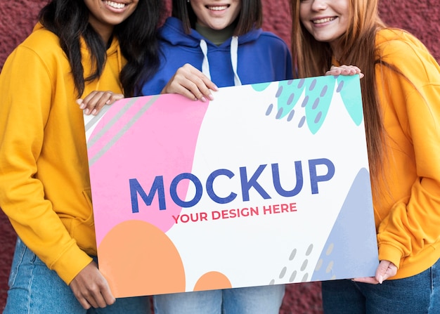 different beautiful women holding a card mock-up