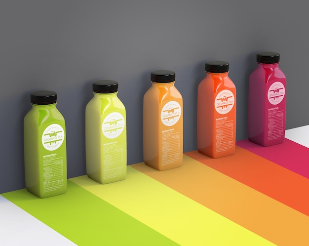 Different smoothies next to gray wall mock-up