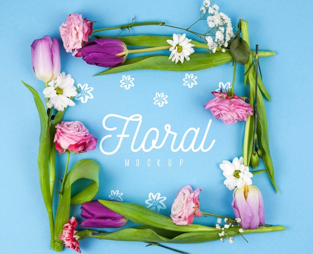 Diversi tipi di fiori che incorniciano mockup