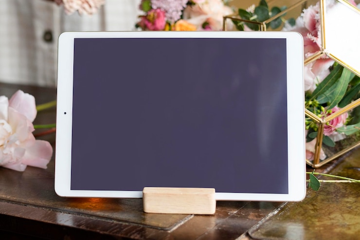 PSD digital tablet screen mockup on a table
