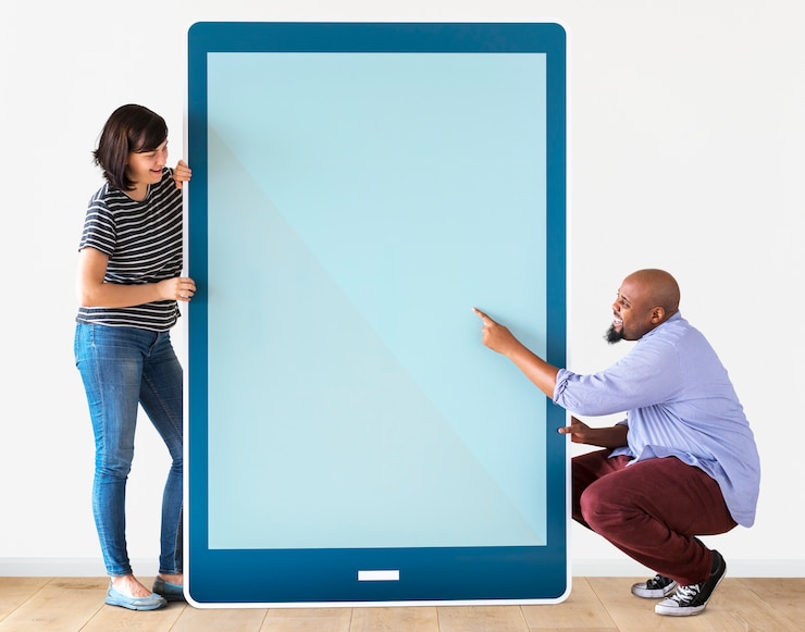 PSD diverse couple holding a tablet with graphics