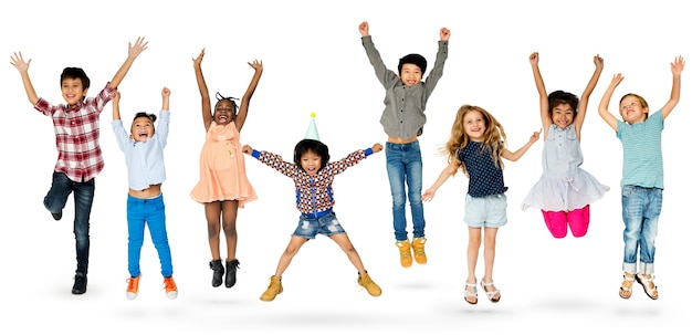 Diverse group of kids jumping and having fun