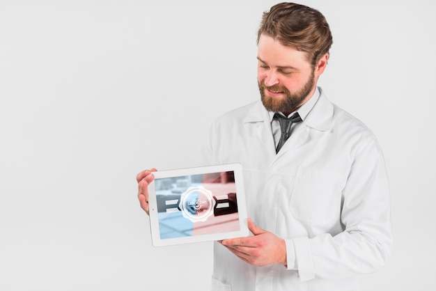 PSD doctor holding tablet mockup for labor day